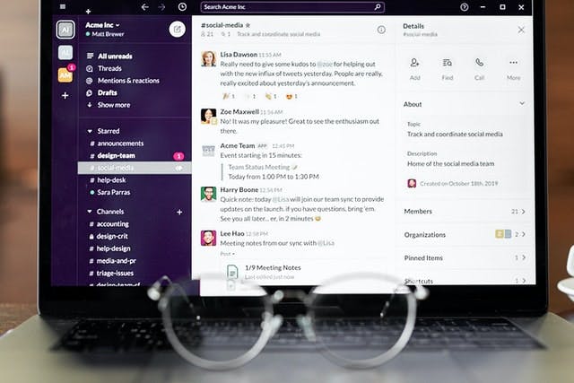 slack channel open on laptop with messages