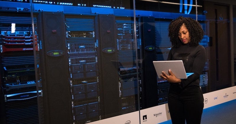 data scientist in front of data server