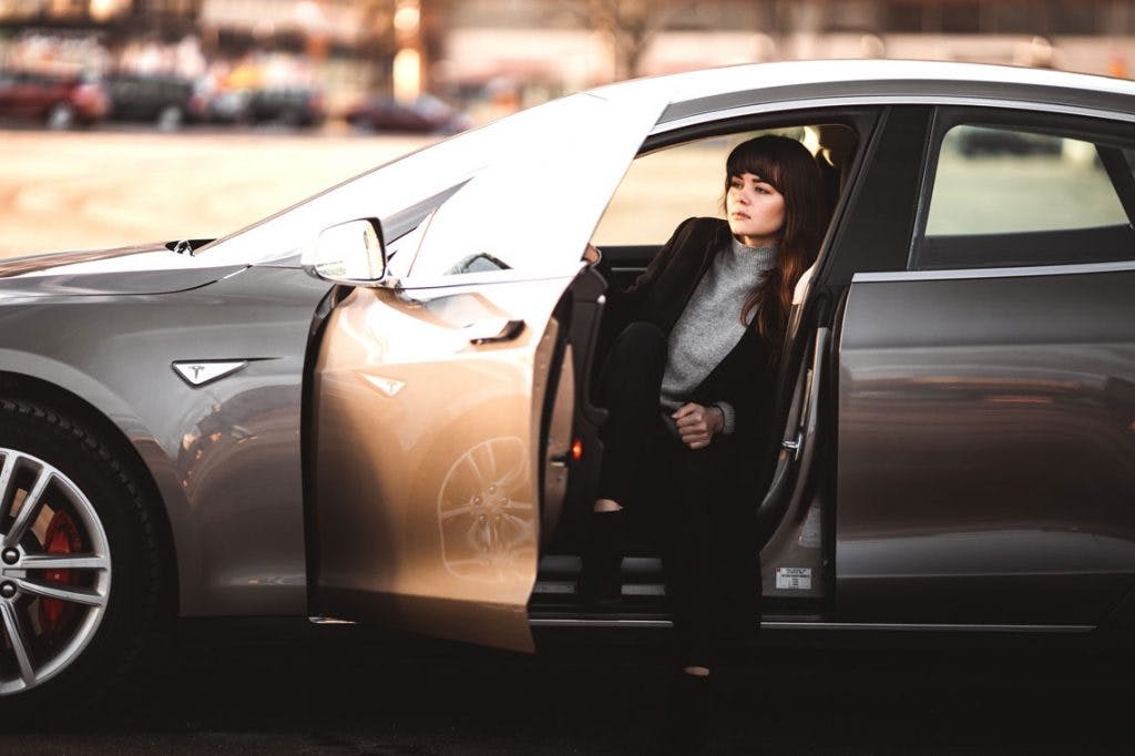businesswoman leaving her car