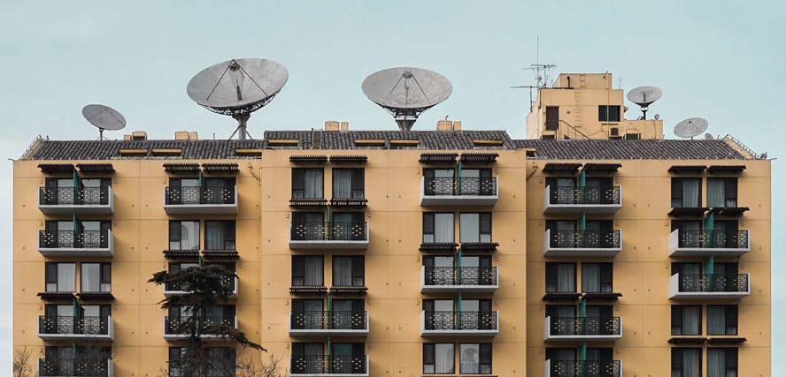 apartment building with antennae on top