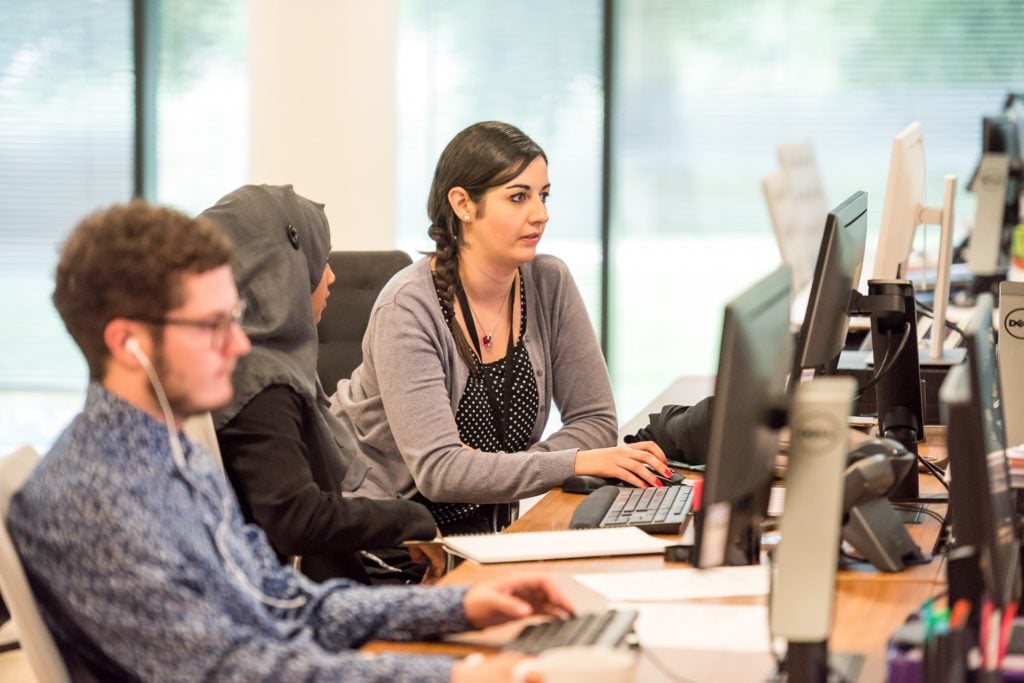 people working at computer
