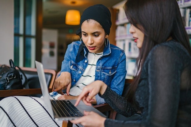 Two people working together