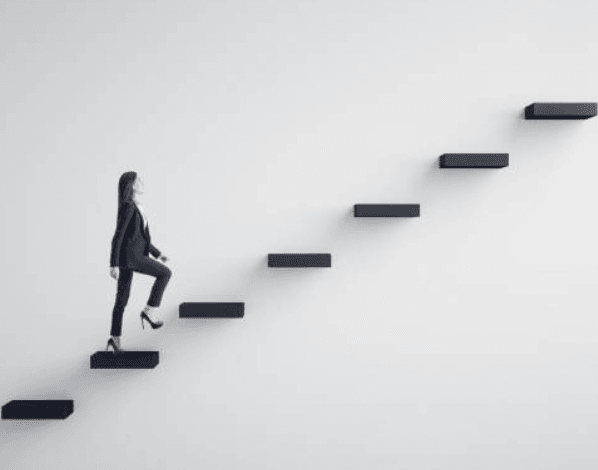 person in business attire walking up floating against white background