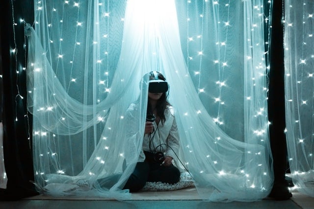girl wearing VR goggles