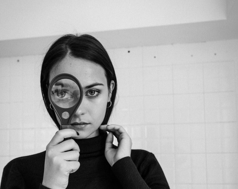 girl with a magnifying glass